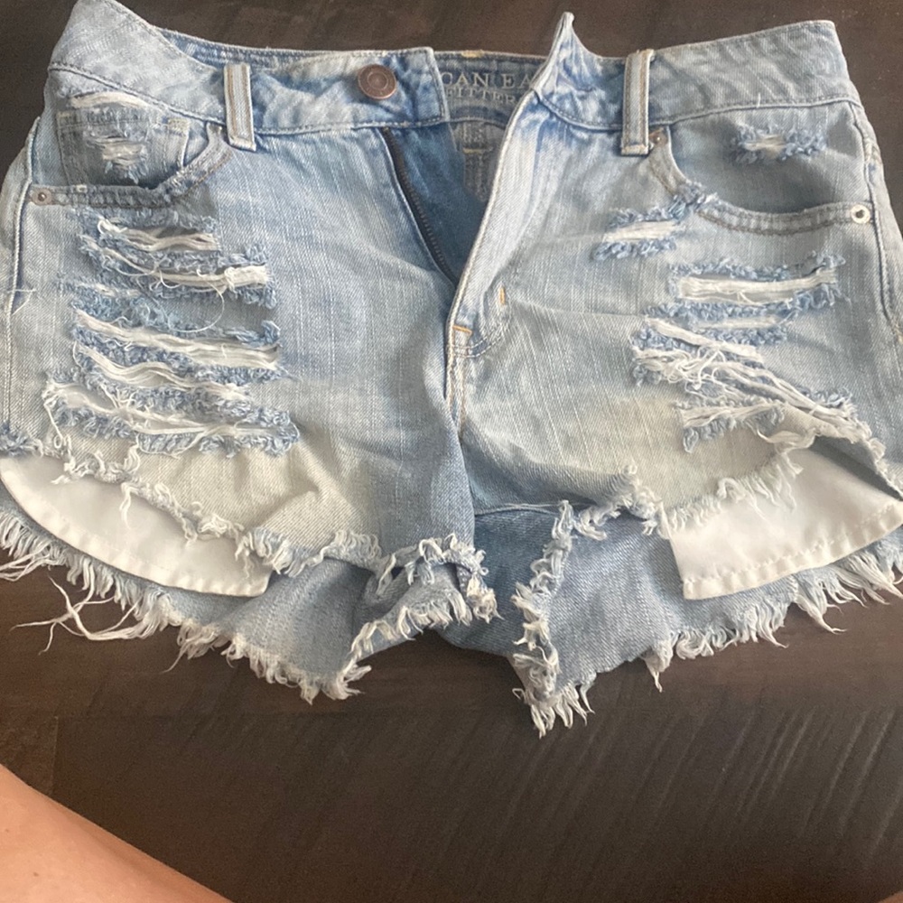 Distressed high waisted light wash denim shorts